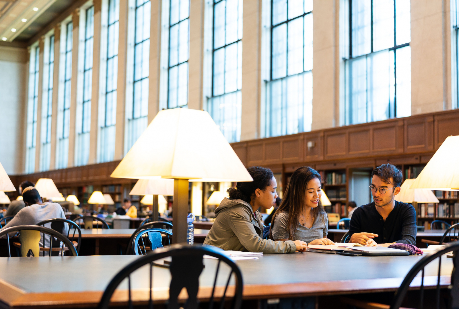 Students study together inside Butler Library