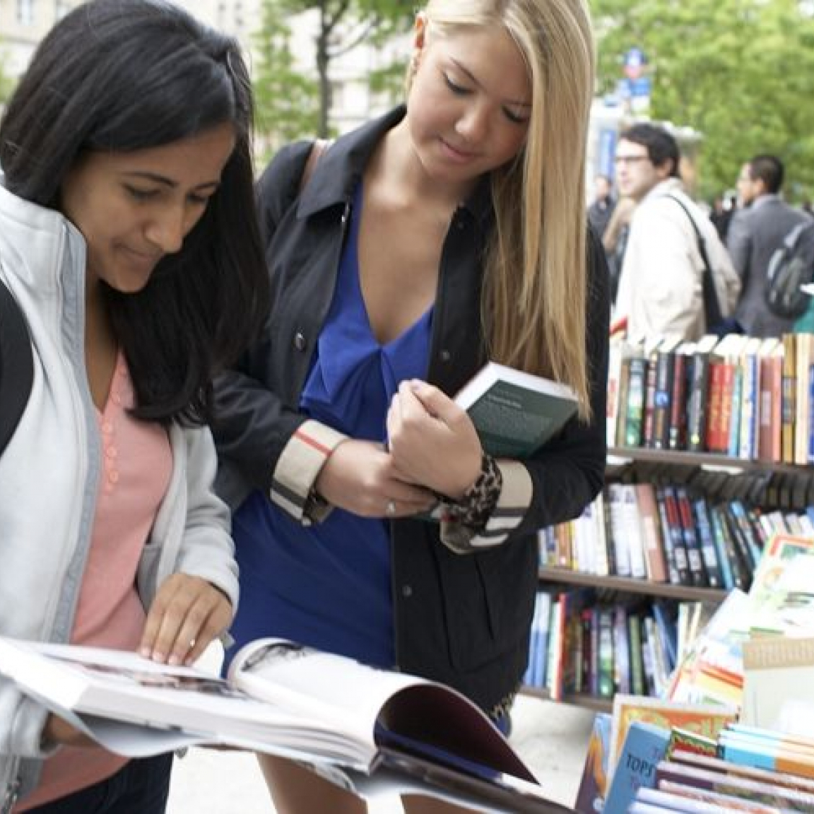 Two students peruse offerings outside of Book Culture in Morningside Heights