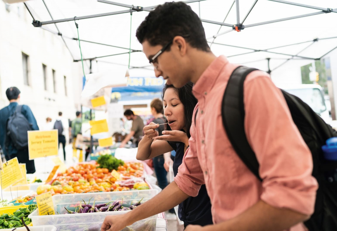 Students at an outdoor market