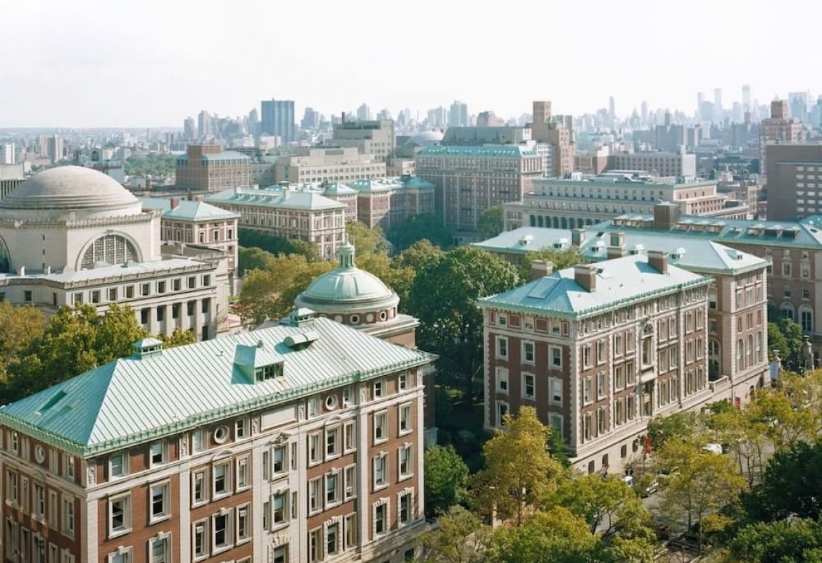 Overhead view of Columbia's campus and the blue/green tops of the buildings.