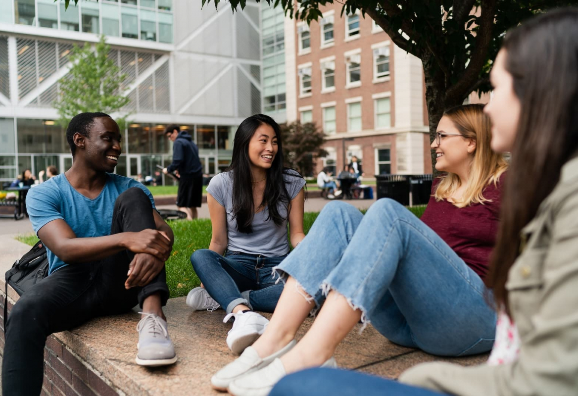 Columbia students hanging out outside of the Northwest Corner Building