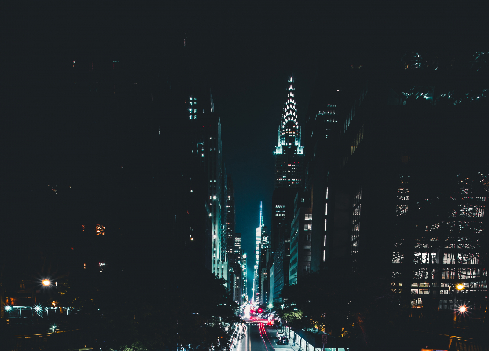 A landscape shot of the NYC skyline at night.