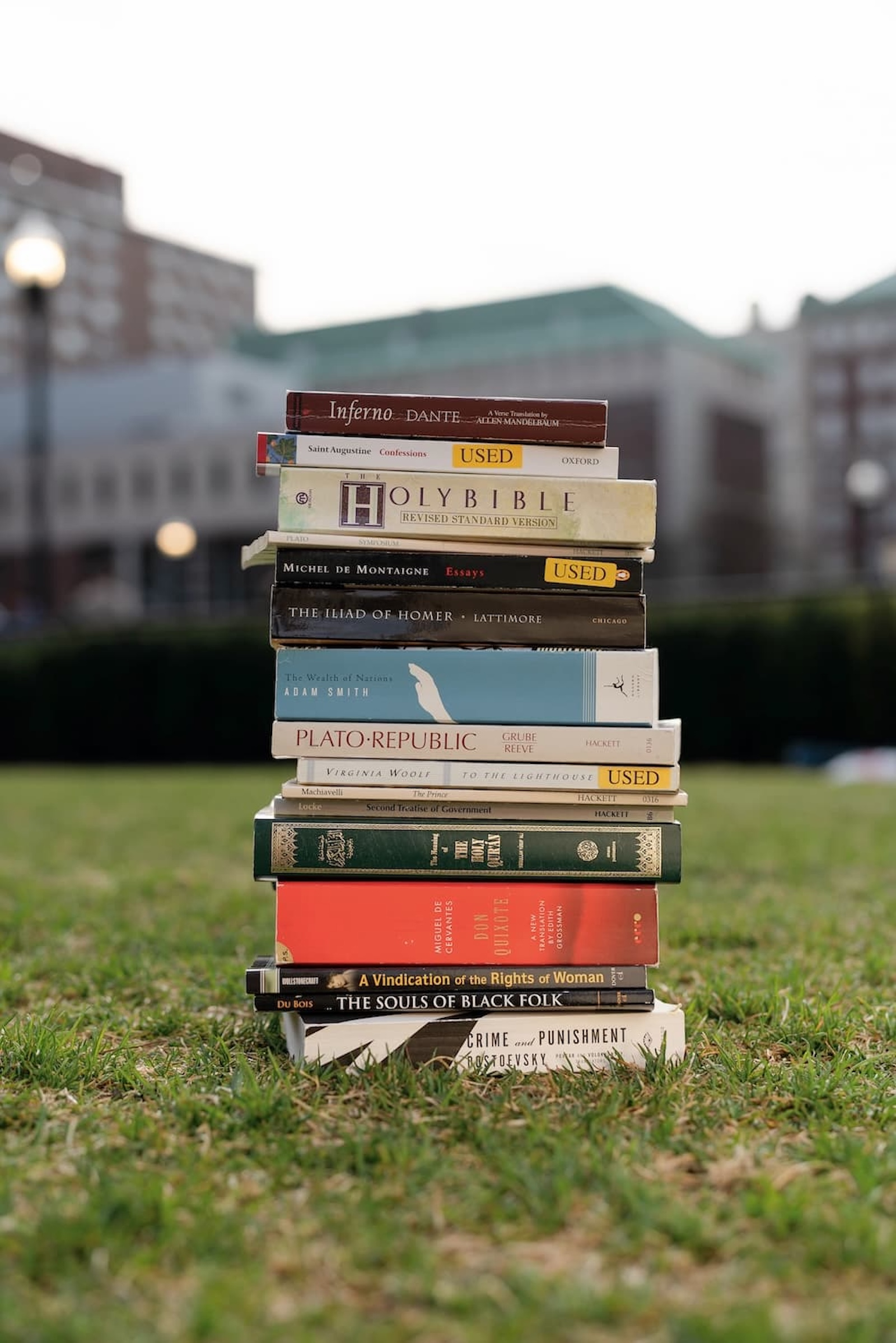 Stack of Core Curriculum books on the lawn