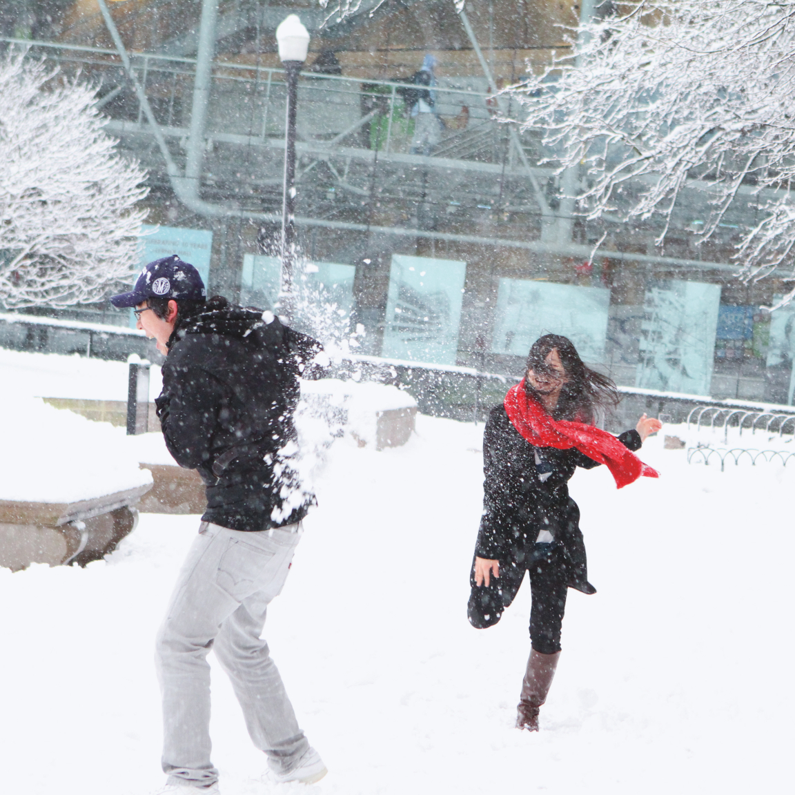 Students having a snowball fight outside Lerner Hall