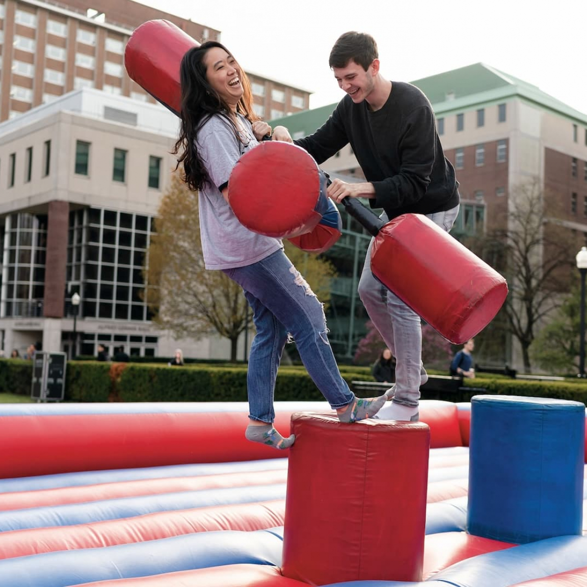 Students playing a blow up fighting game