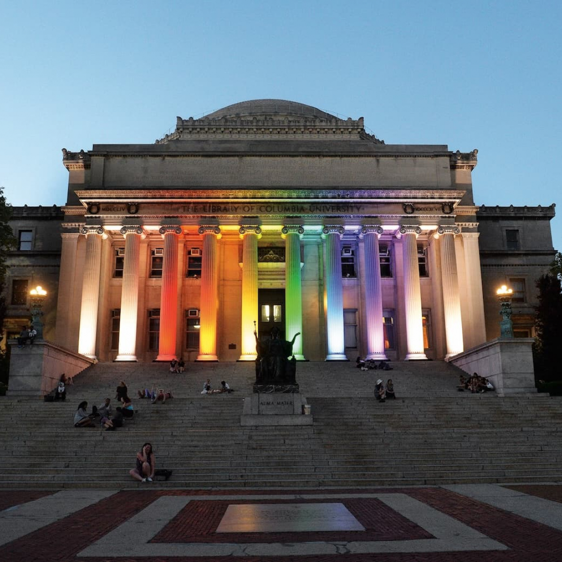 Low steps lit up in a rainbow
