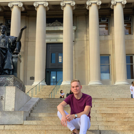 Columbia student Adam sits on Low Steps