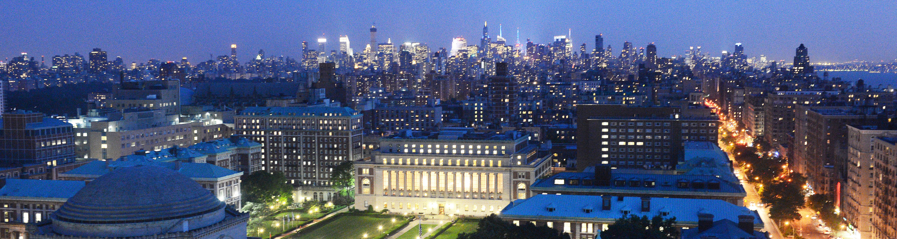 An aerial shot across Columbia's campus towards Midtown Manhattan