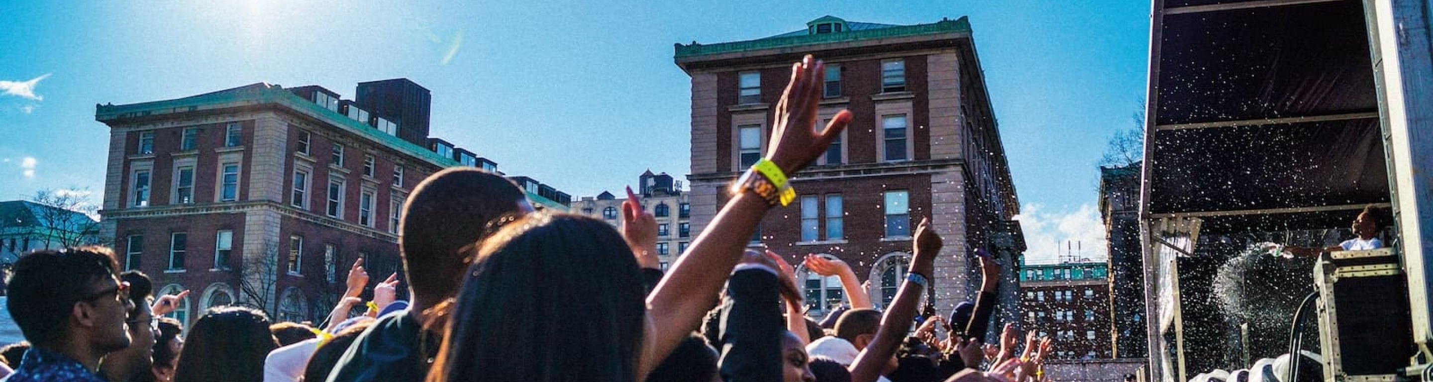 Students at Bacchanal concert on a sunny day