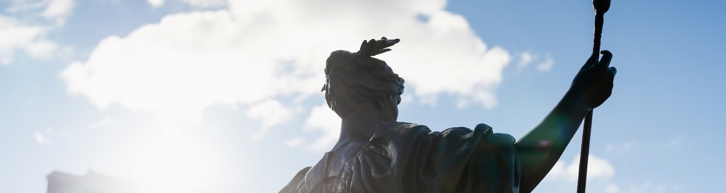 Alma Mater statue in the sun