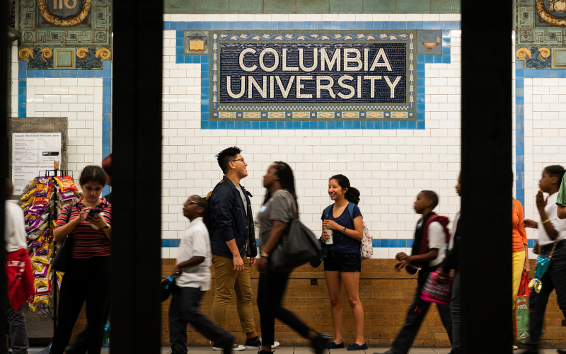Columbia subway station interior with students