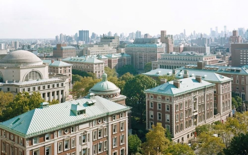 Overhead view of Columbia's campus and the blue/green tops of the buildings.