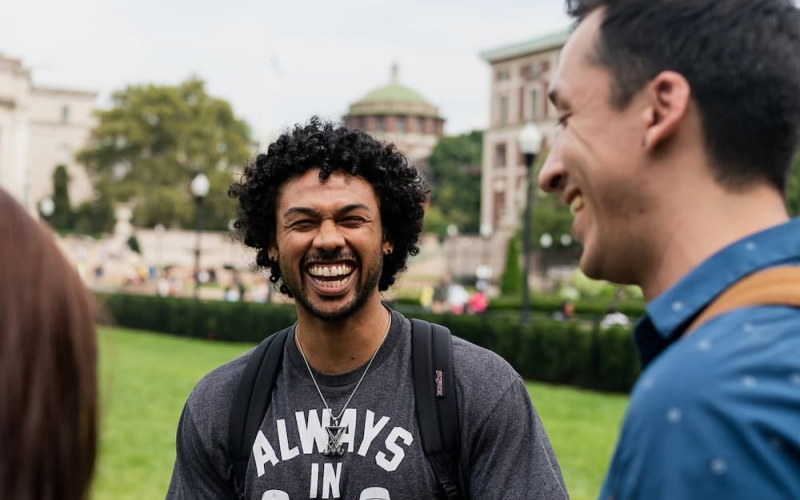 students laughing on South Lawn